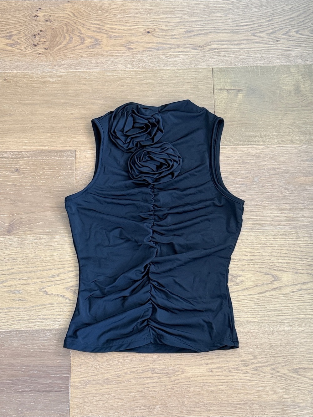 Black Sleeveless Ruched Tank Top with Floral Rosette Accents